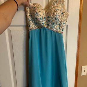 Over the shoulder blue prom dress